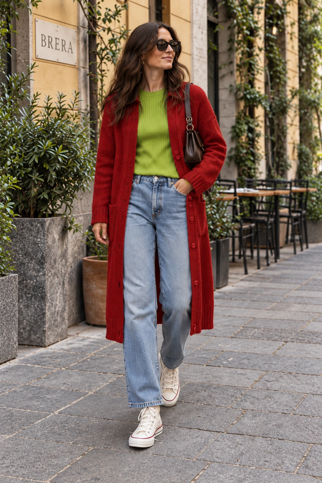 Red, at length. A cardigan to mid-calf is quite a lot of red. Worn open, it leaves a strip of lime above the washed jeans; cream Converse keep the long hem from looking too dressed up.